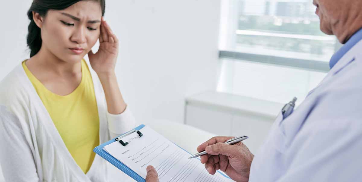 Doctor giving patient consultation